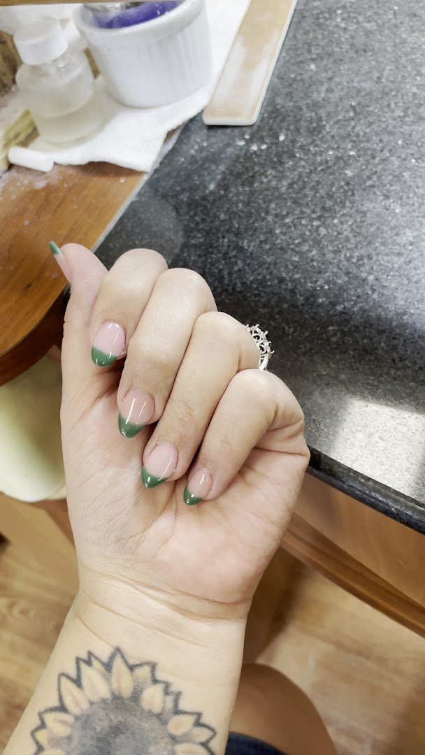 Manicure station with polish bottles nearby.