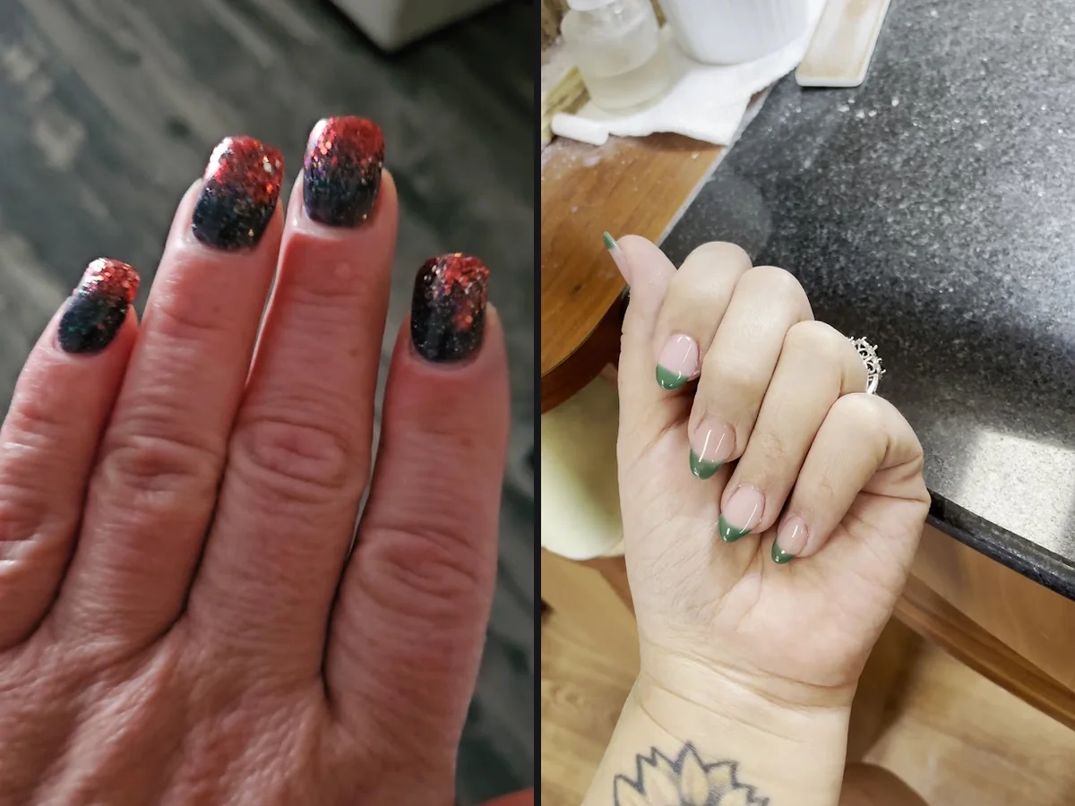 Neatly painted nails on a salon hand display.